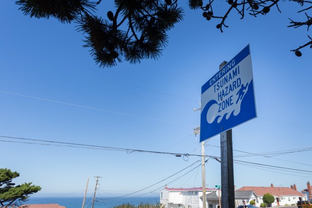 A tsunami warning sign along a coastal highway near the Oregon coast.